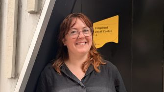 Portrait of Claire outside the Kingsford Legal Centre