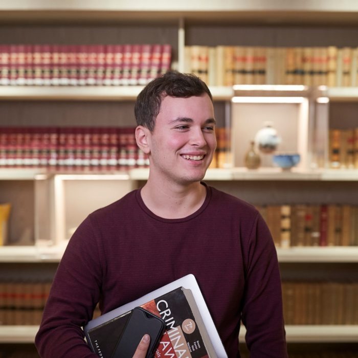 Law student portrait in Law Library