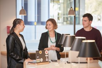 Law students in library study space