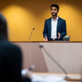 Male student speaking in moot court