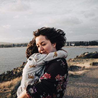 a woman holding her child