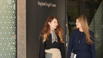 Two female Law students in front of Kingsford Legal Centre