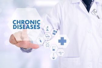 Image of doctor touching "Chronic Diseases" on an imaginary digital panel