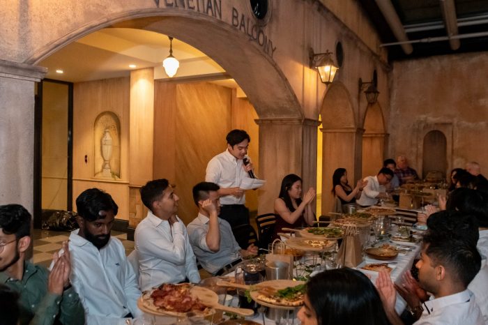 SWS Clinical Medicine Students having dinner and listening to a speech 