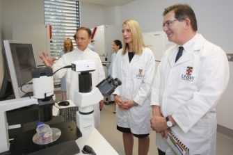Federal Health Minister Greg Hunt, Associate Professor Kerrie McDonald and Professor Ian Jacobs