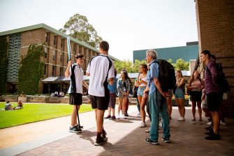Photograph of incomig studenta socialing at orientation week