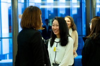 Student talking to potential employer