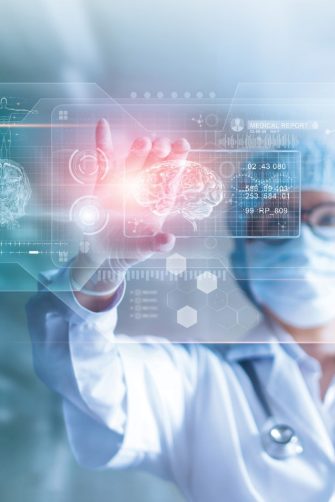 a clinician looking at a virtual picture of a brain