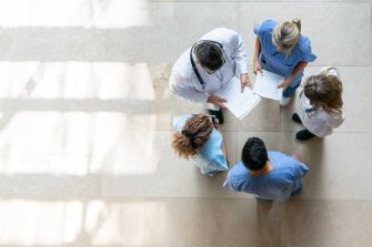 Researchers standing in a circle
