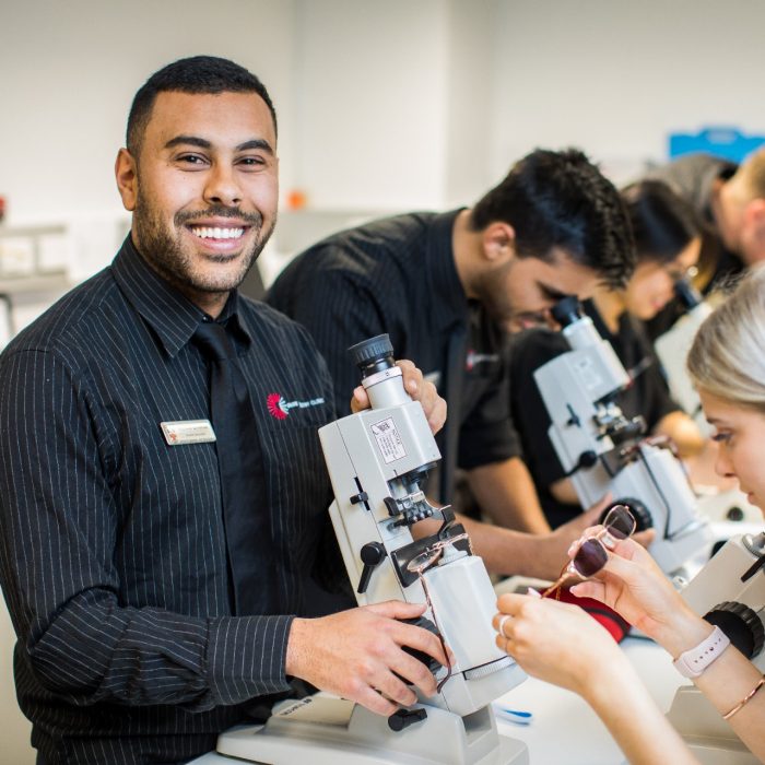 Photograph of science students using microscopes