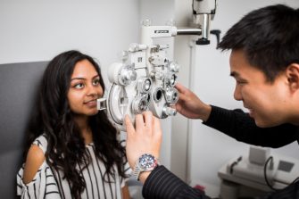 Photograph of an eye test taking place
