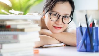 student with glasses