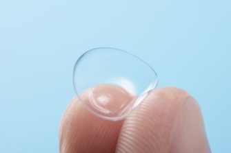 contact lens on finger
