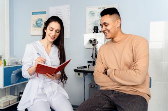 Optometrist with a patient