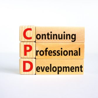 CPD, continuing professional development symbol. Wooden blocks with words CPD, continuing professional development on beautiful white background. Business, CPD concept.