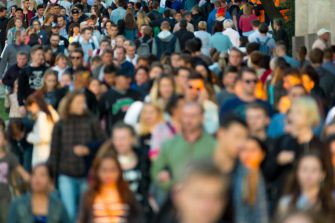 Crowd of people on the street. No recognizable faces