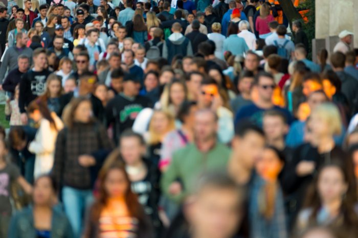 Crowd of people on the street. No recognizable faces