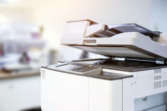 Copier printer, Close up the photocopier or photocopy machine office equipment workplace for scanner or scanning document and printing or copy paper duplicate and Xerox.