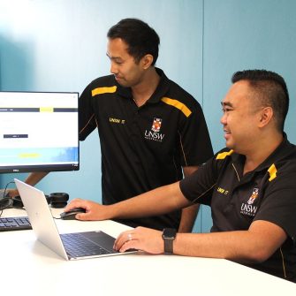 IT support staff helping people