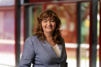 Headshot portrait of Dr Tracey Hanley