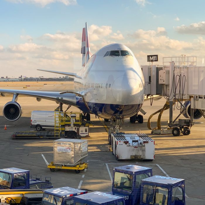 White passenger plane at terminal