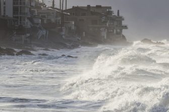 Waves breaking on shore