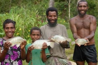 People holding fish