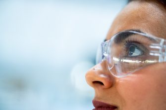 Woman in safety glasses
