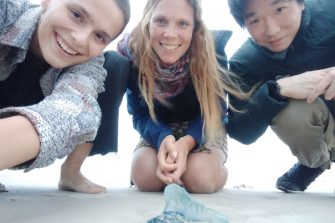 Photo of researchers at the beach