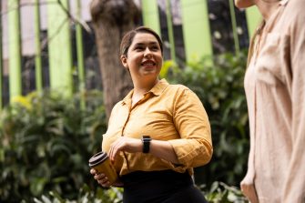 Negin Sarmadi walking across Campus