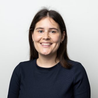 A headshot of a student looking at the camera and smiling.
