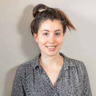 A headshot of a student looking at the camera and smiling.