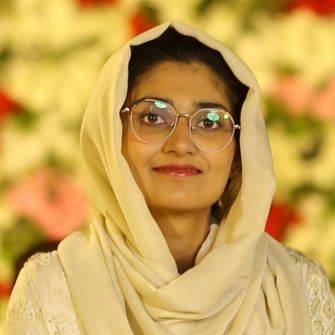 A headshot of a student looking at the camera and smiling.
