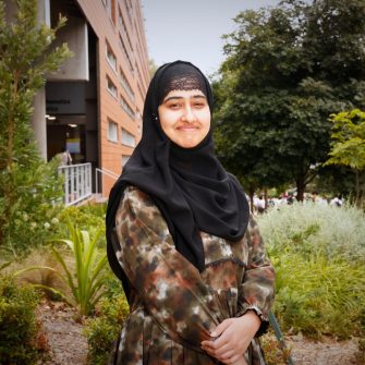 A headshot of a student looking at the camera and smiling.