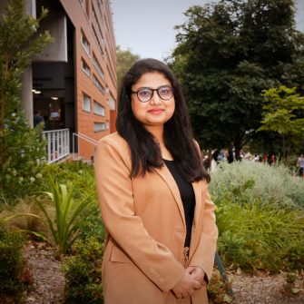 A headshot of a student looking at the camera and smiling.