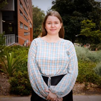 A headshot of a student looking at the camera and smiling.
