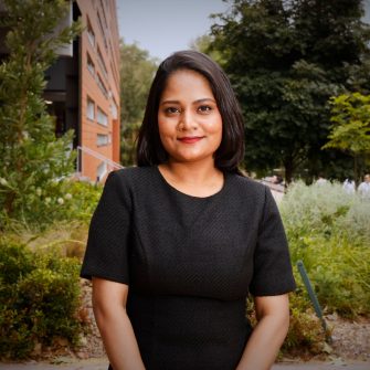 A headshot of a student looking at the camera and smiling.