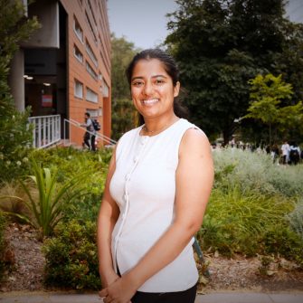A headshot of a student looking at the camera and smiling.