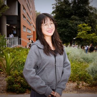 A headshot of a student looking at the camera and smiling.