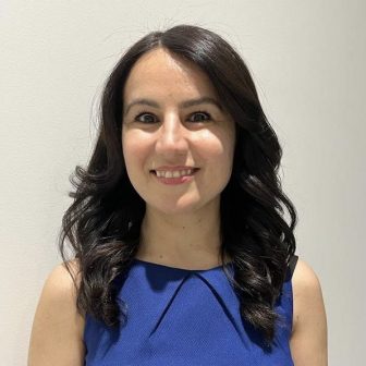 A headshot of a student looking at the camera and smiling.