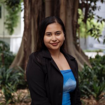 A headshot of a student looking at the camera and smiling.