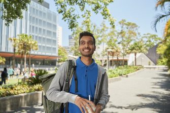 Student walking at UNSW during a break.