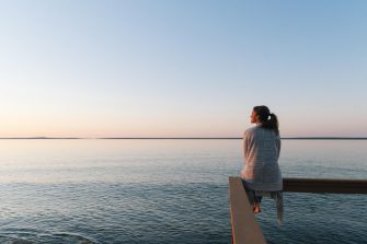 Woman looking out to sea