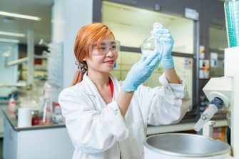 A female student working in a chemistry lab