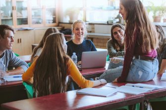 Group of students in classroom talking