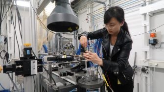 Woman working with equipment in a lab