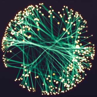 Glowing spheres connected with axon-like lines.