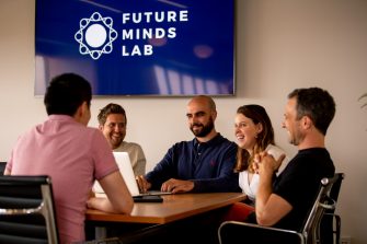 Photograph from the future mind psychology eventof multiple students discussing