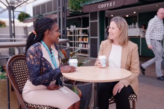 Angela Nickerson having coffee with Tabitha Chepkwony from Regional Opportunities Australia (ROA)