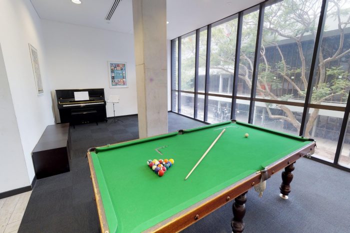 common room pool table, games, piano